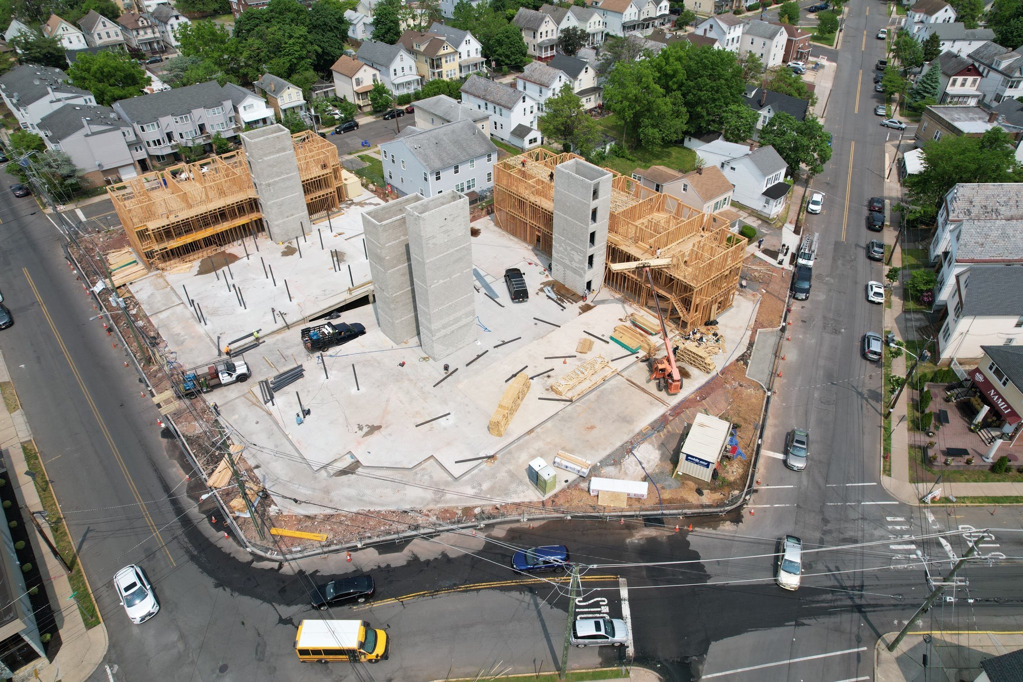 Aerial view of a mixed-use building under construction, Kurt J. Ludwig, AIA