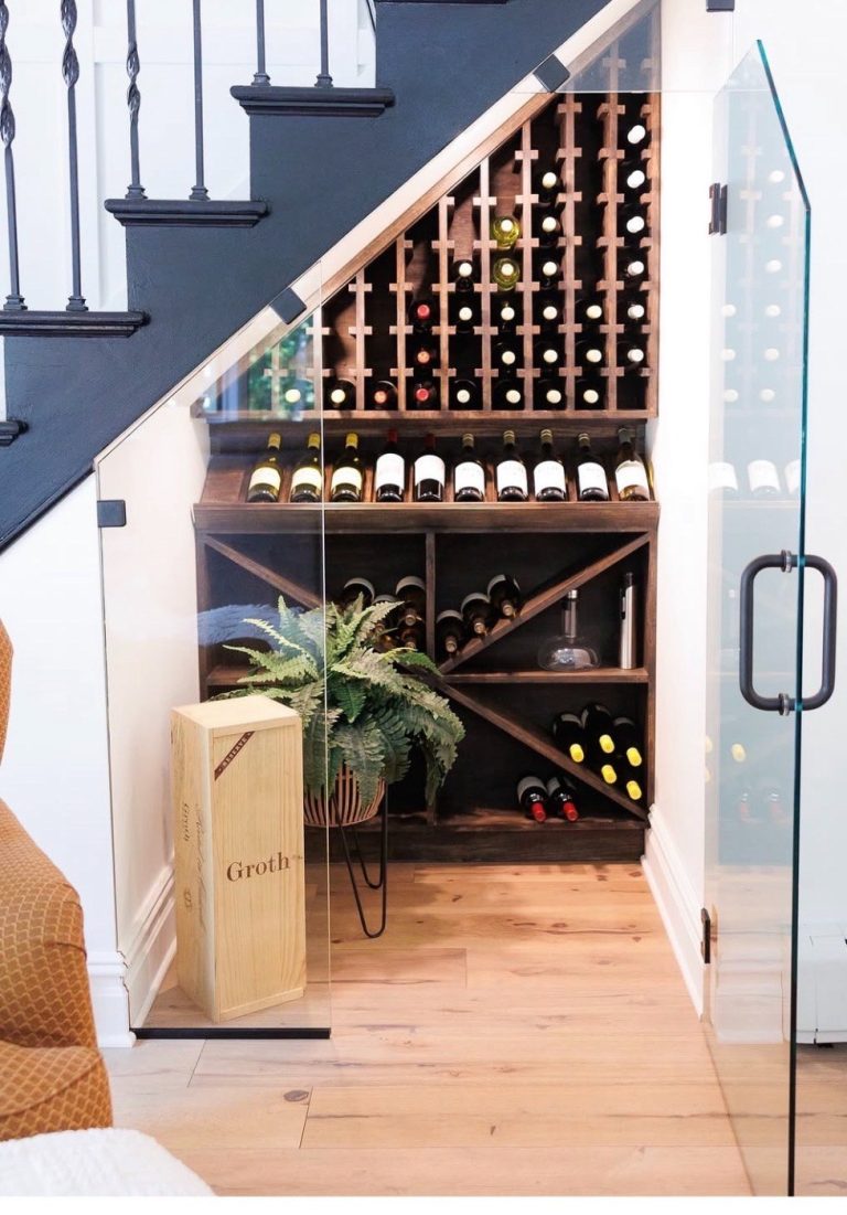 Open stair with wine storage below, interior by Kurt J. Ludwig, AIA